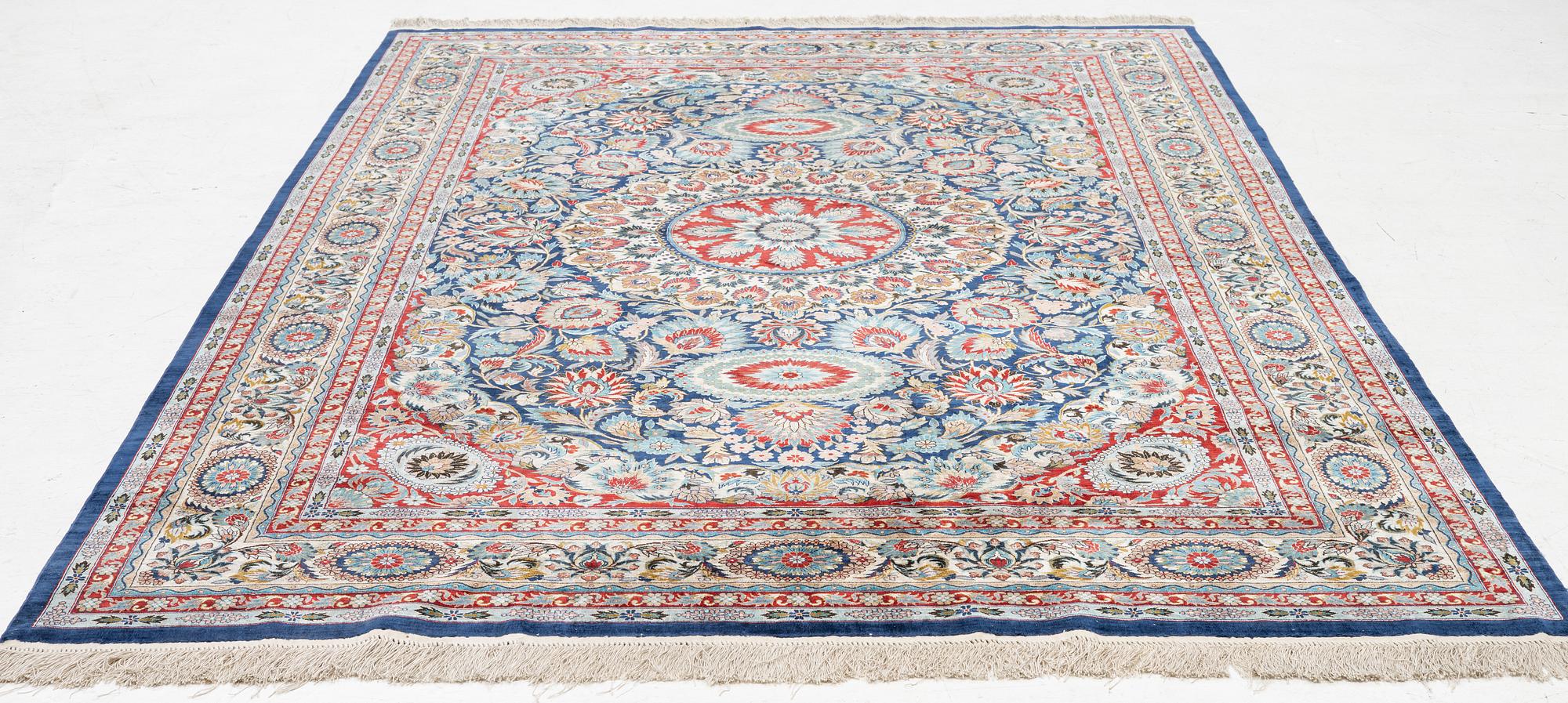An oriental silk rug. c. 274 x 180 cm .