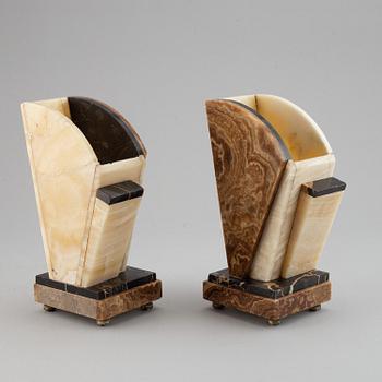 A three piece clock garniture, Art Deco style, 20th Century.