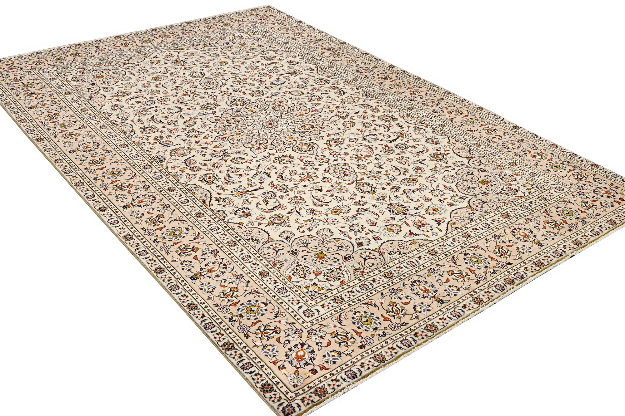 A Keshan carpet, c. 355 x 238 cm.