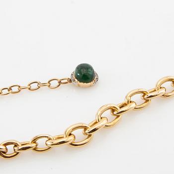 Necklace 18K gold with a cabochon-cut green tourmaline and rose-cut diamonds.