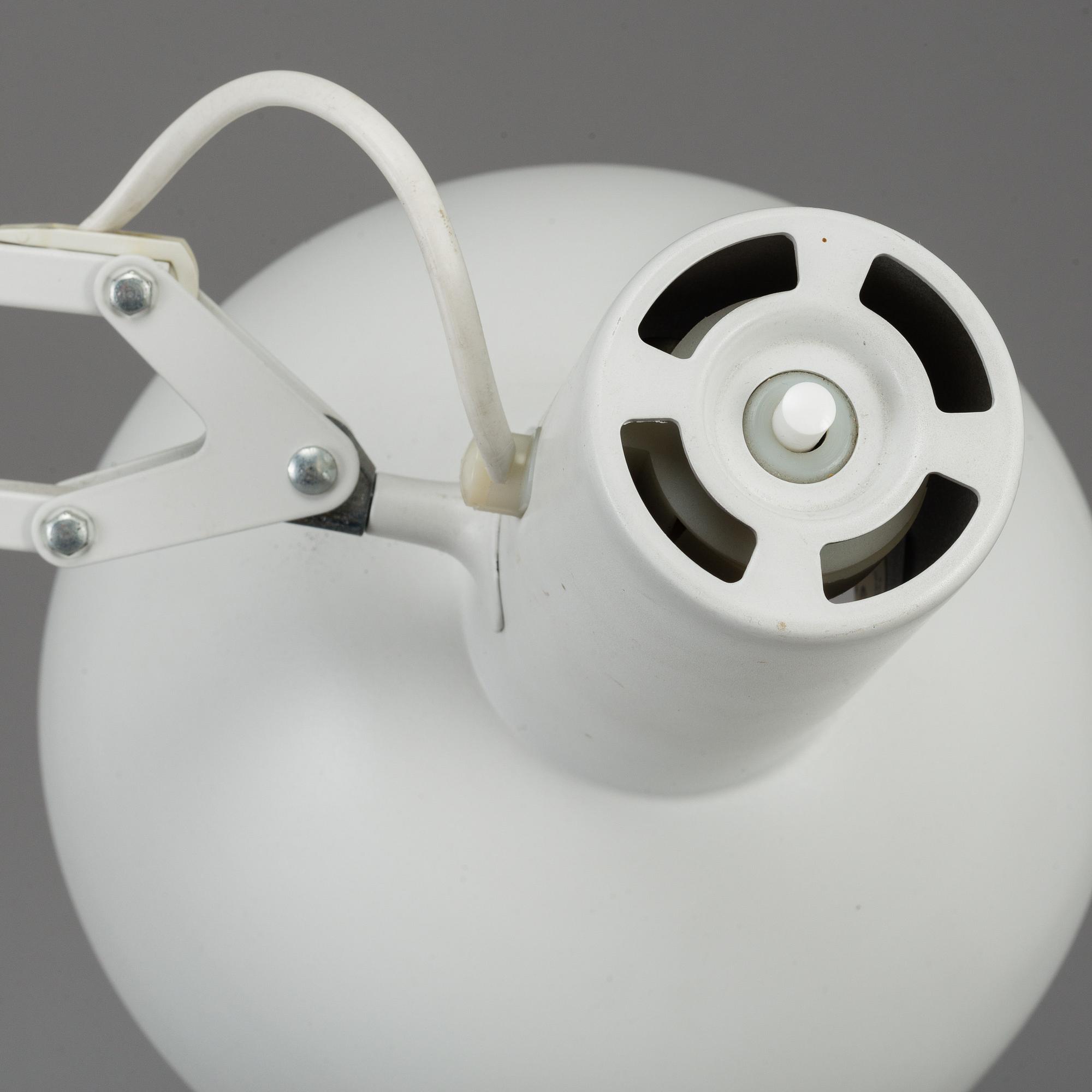 A Louis Poulsen "IT" metal writing desk light.