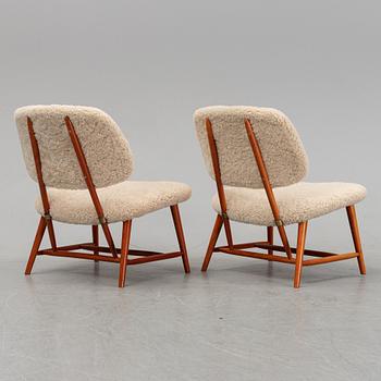 A 1950's pair of 'TeVe' easy chairs by Alf Svensson.