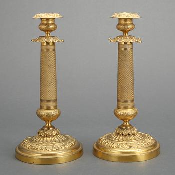 A pair of Russian 1830/40's brass candlesticks.