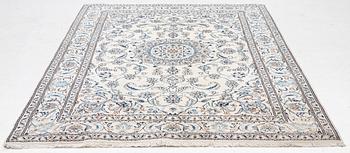 A Nain carpet, c. 275 x 195 cm.