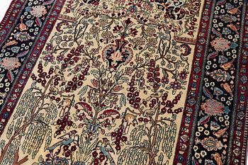 An antique Isfahan rug, ca 235 x 145 cm.
