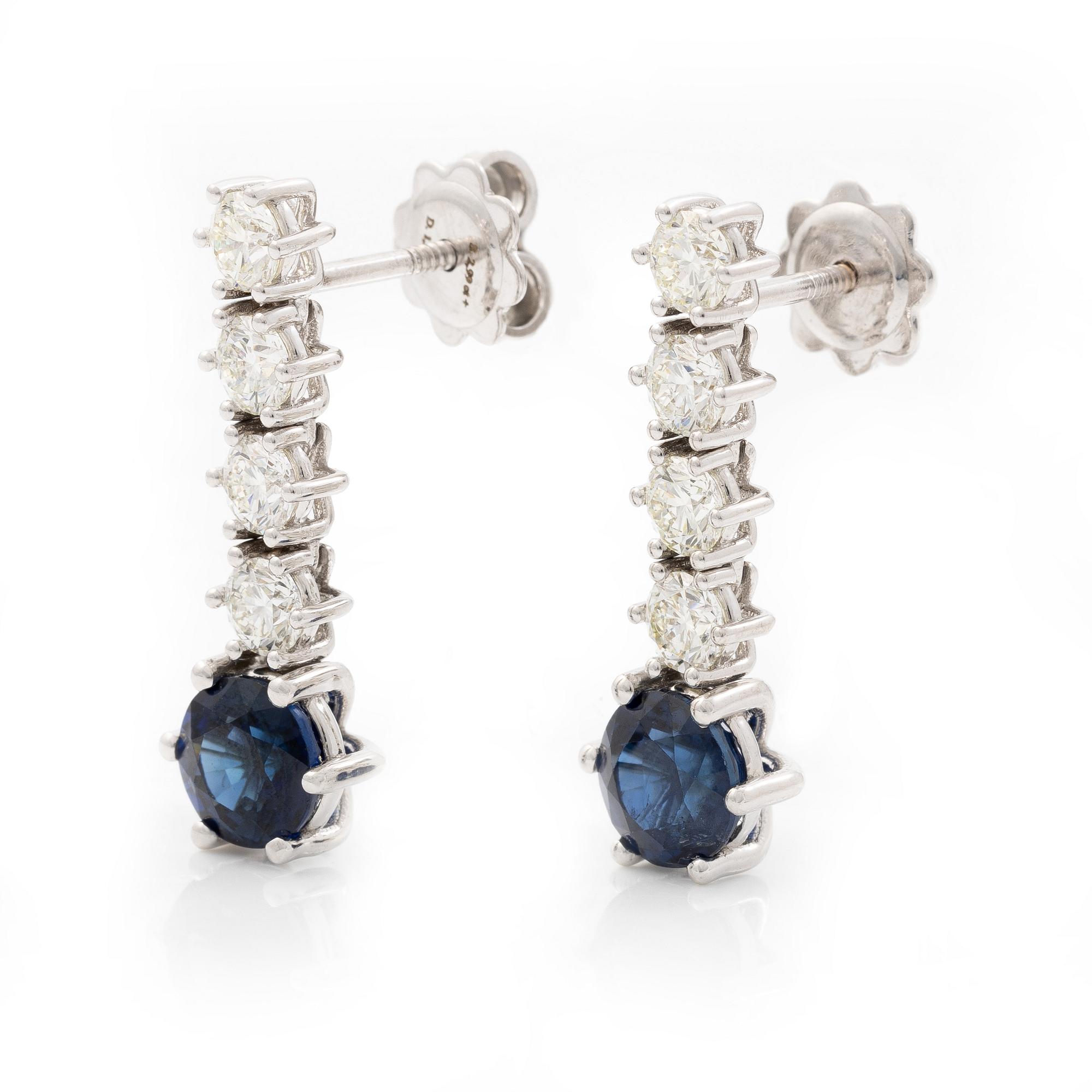 Earrings 18K white gold with sapphires and brilliant-cut diamonds.