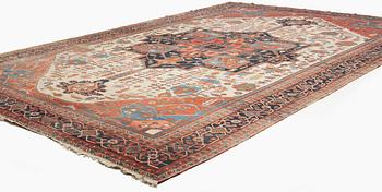 An antique Heriz Serapi carpet, West Persia, c. 616 x 407 cm.