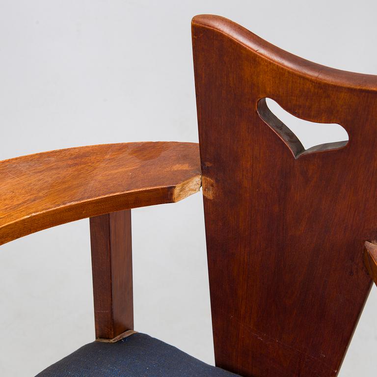 A pair of Arts and Crafts armchairs, early 20th century.