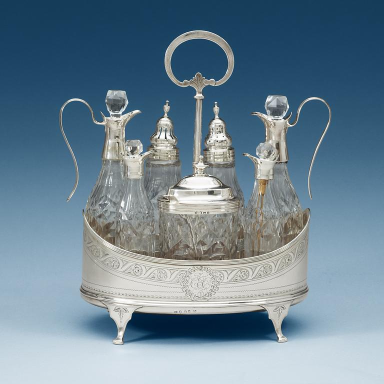 An English 18th century silver and glass cruet-set, unidentified makers mark, London 1797.