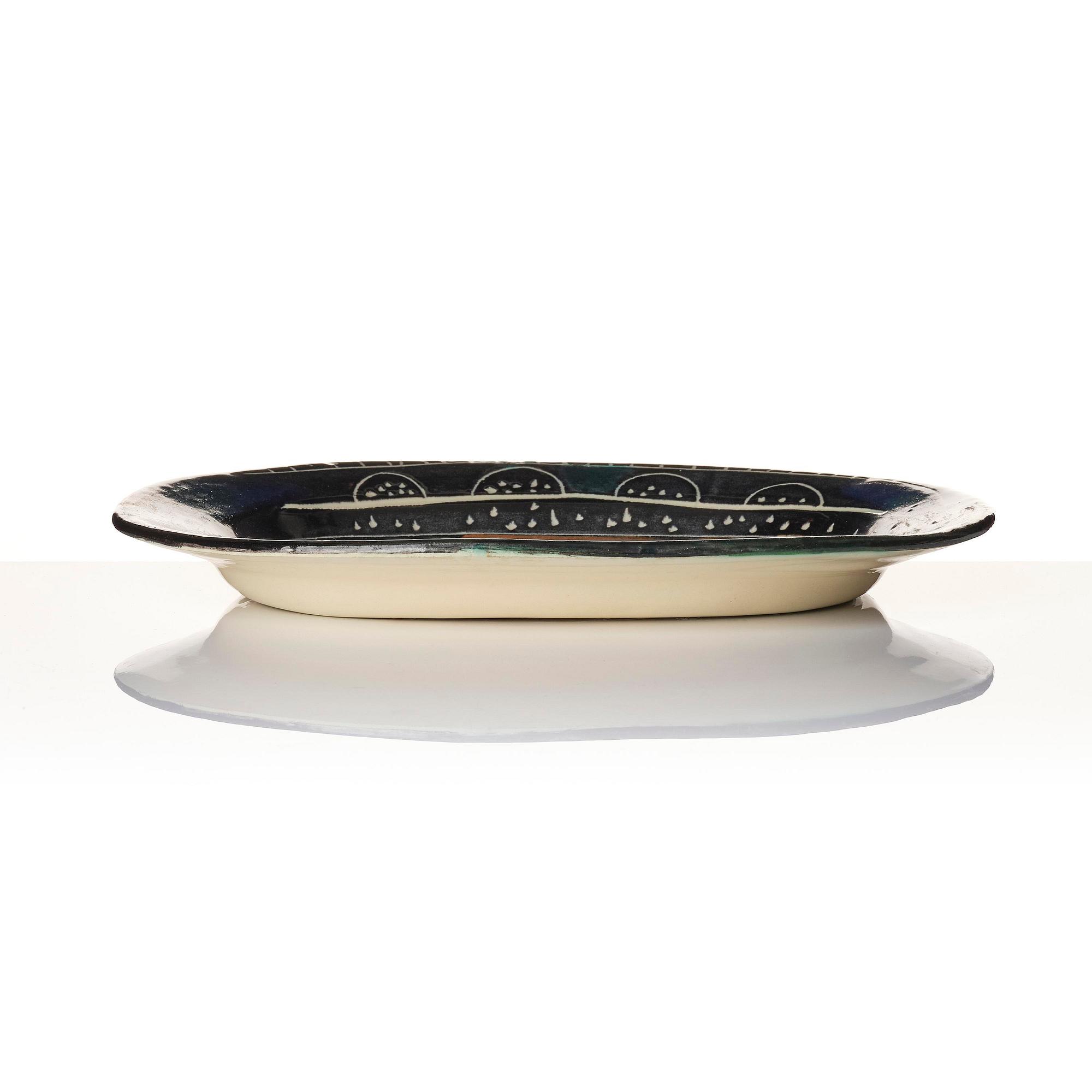 Pablo Picasso, a "Corrida verte" (A.R. 81) faience dish, Madoura, Vallauris, France, post 1949.