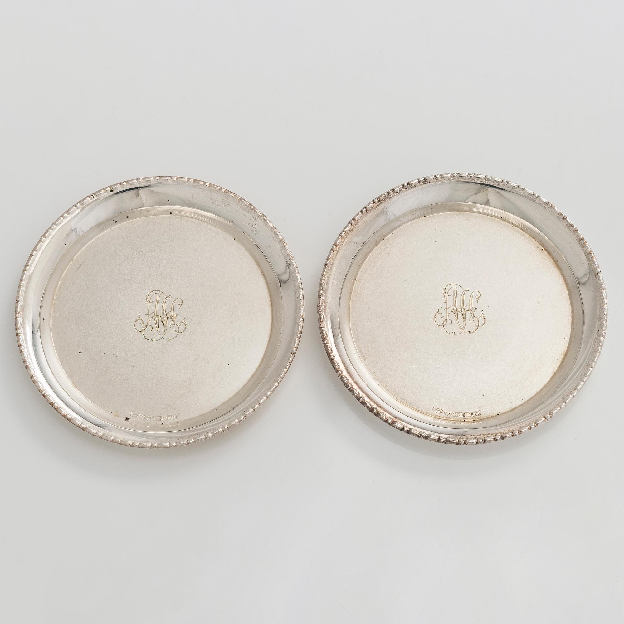 A 12-piece set of silver glass coasters, Kultakeskus, Hämeenlinna 1952. In original fitted case.