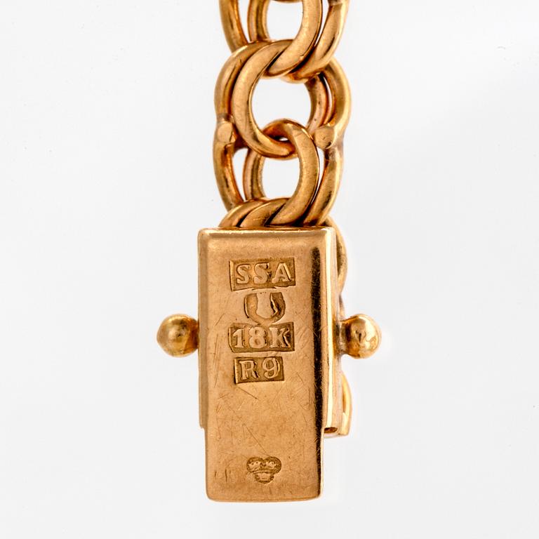 Armband, 18K guld, bismarcklänk med berlock.