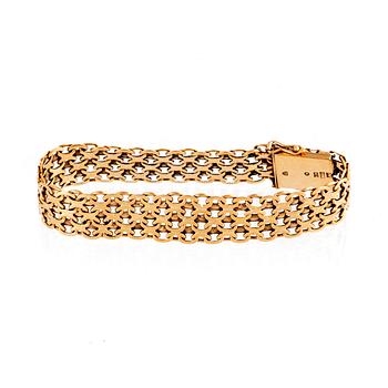Armband 18K guld X-länk Stockholm 1962.