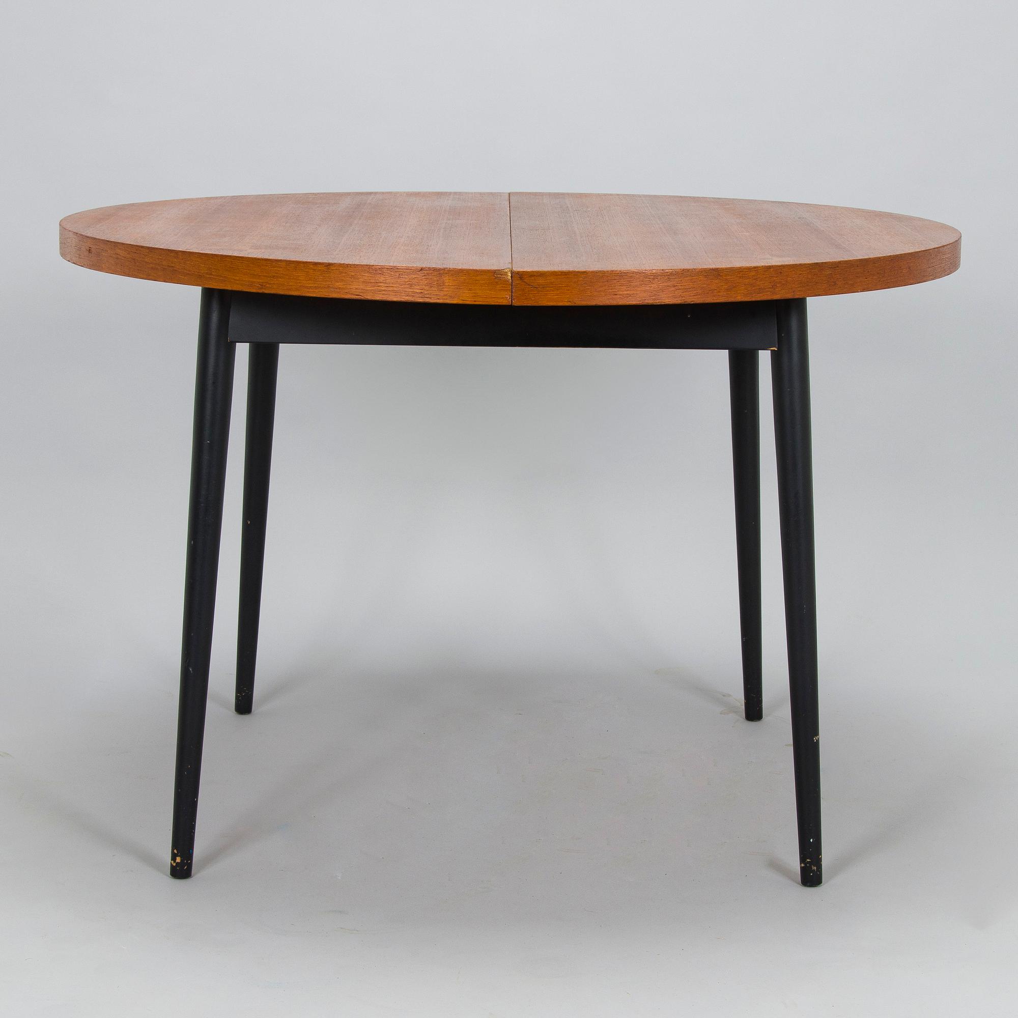 A mid-20th century dining table.