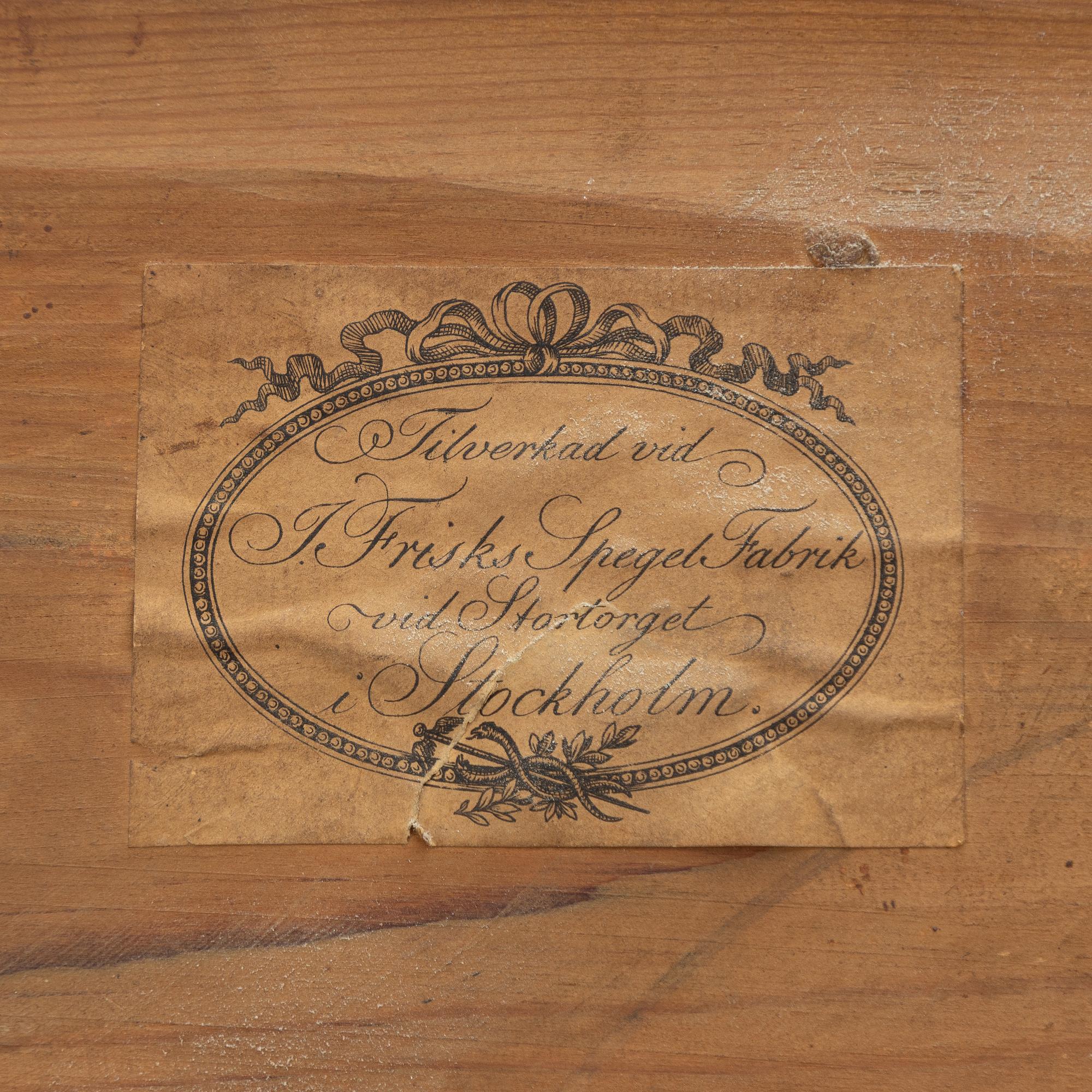 Empire, A late Empire mirror, first half of the 19th century.