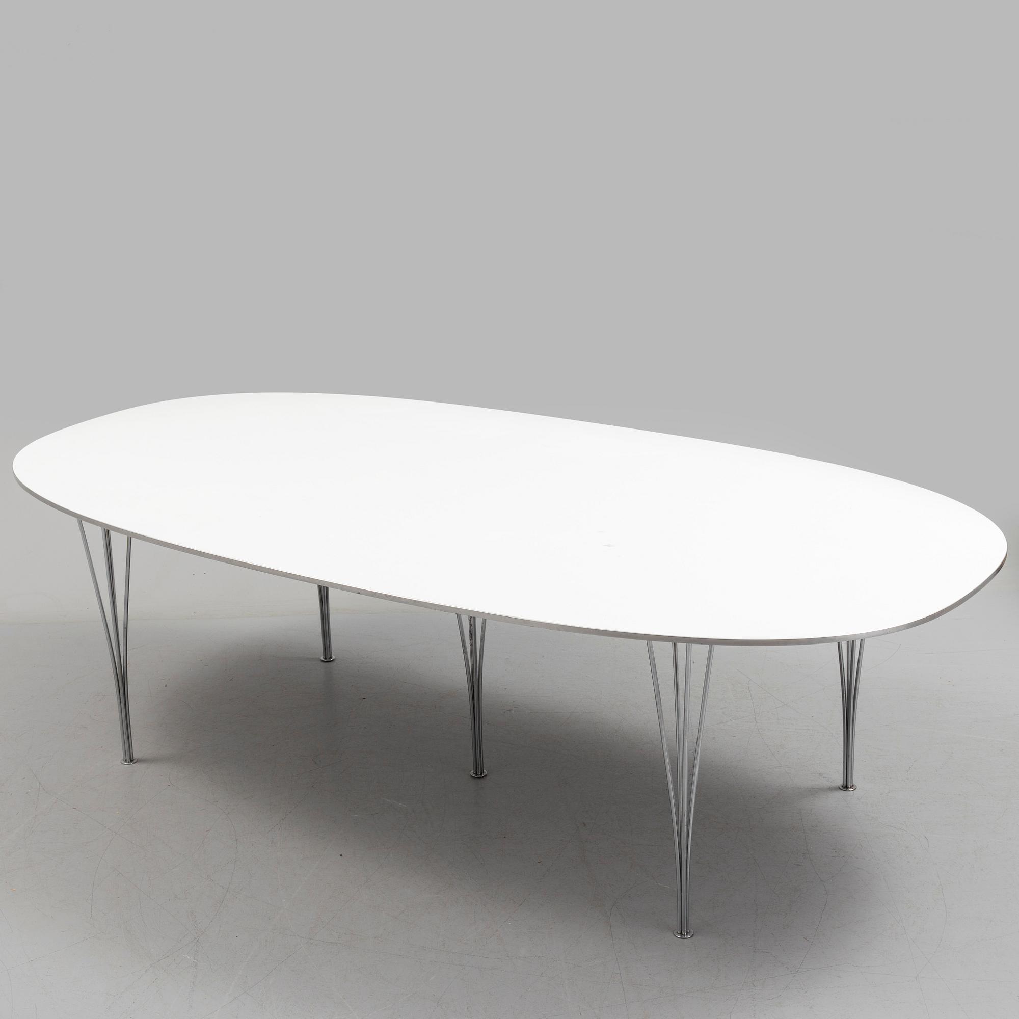 A "Superellips" table by Bruno Mathsson and Piet Hein for Fritz Hansen.