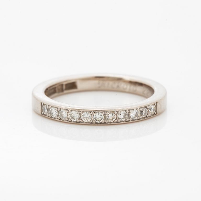 Brilliant-cut diamond half eternity ring.