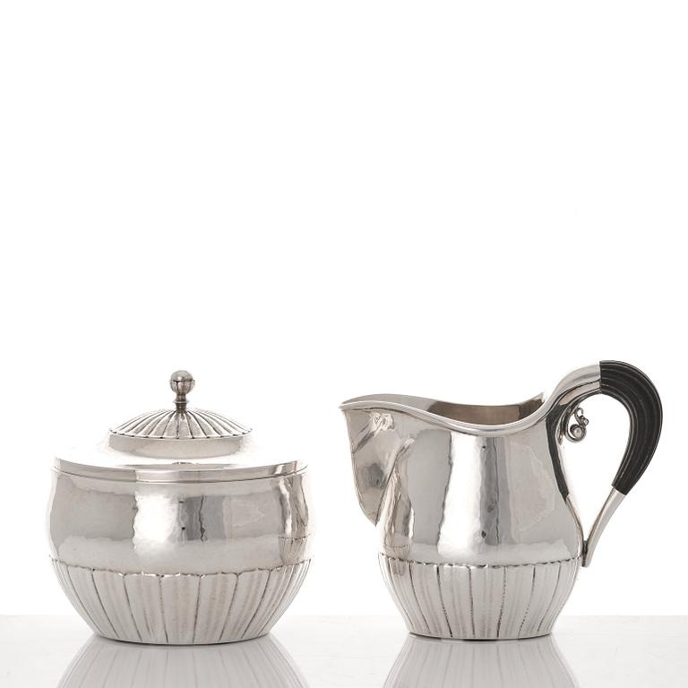 Johan Rohde, a three pieces sterling silver coffee service "Cosmos", Georg Jensen, Copenhagen 1945-77, design nr 45 A + D.