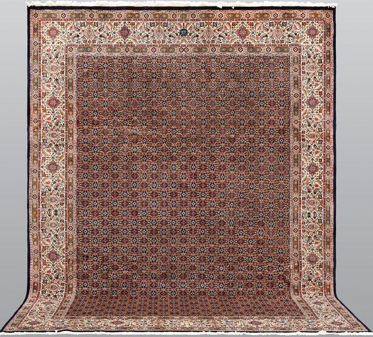 A Moud part silk carpet, signed, 335 x 250 cm.
