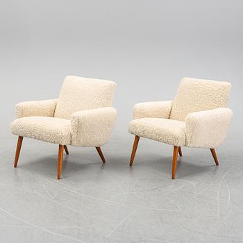 A fair of Danish 1950's easy chairs.