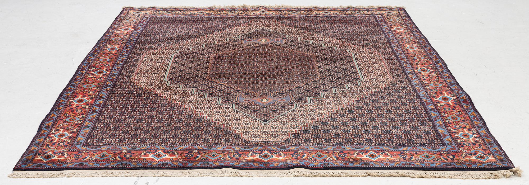 A Senneh carpet, c. 284 x 204 cm.