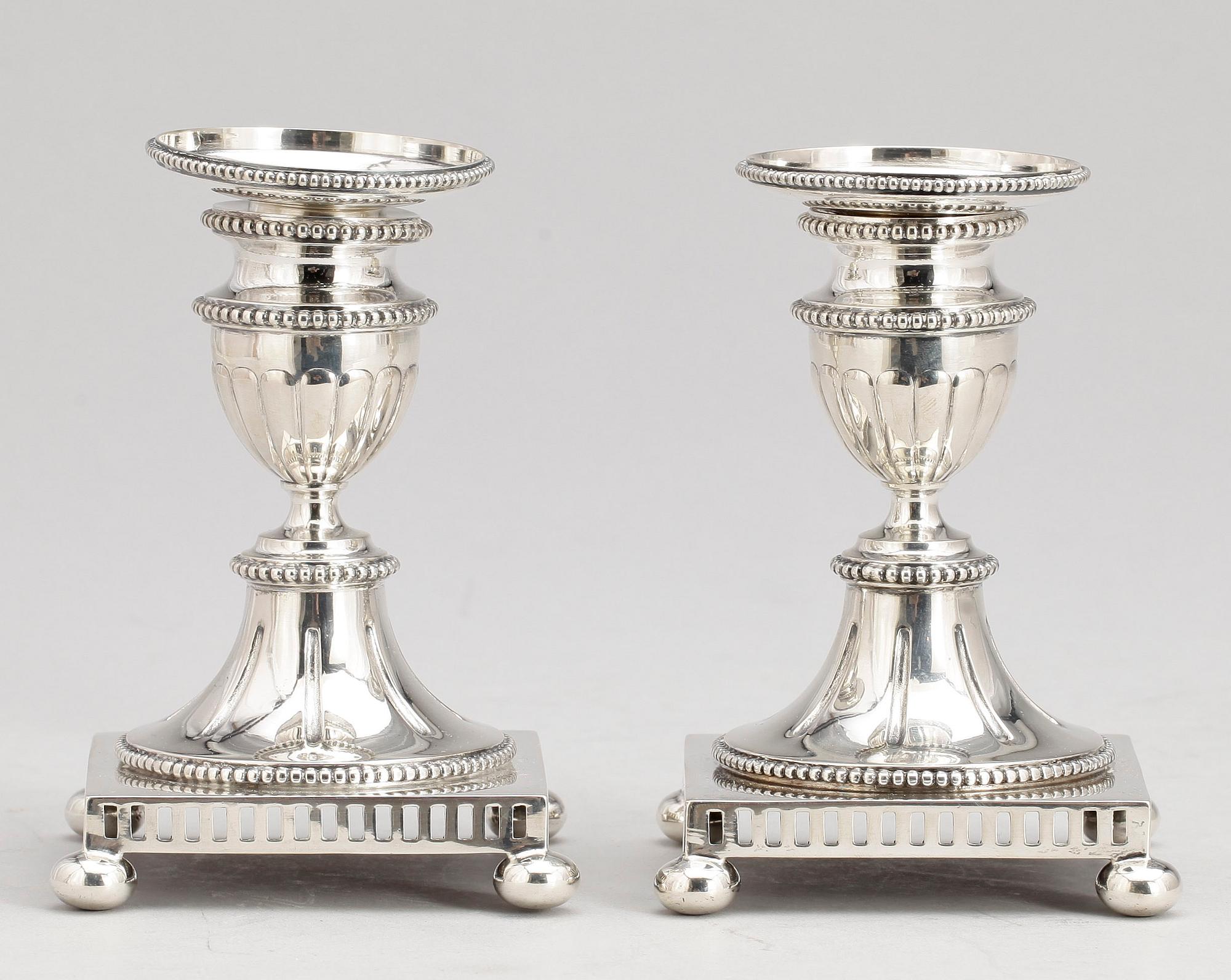 LJUSSTAKAR, ett par, silver, K Anderson, Stockholm, 1903. Totalvikt ca 299 g.