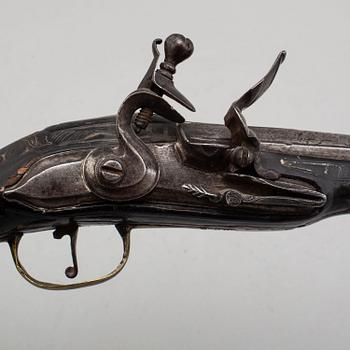 An 18th century  flintlock pistol for the oriental market.