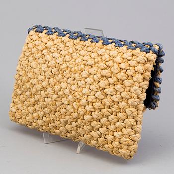 A  bast clutch by Ralph Lauren.