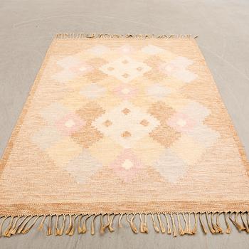 Rölakan rug signed ILS, approximately 233x168 cm.