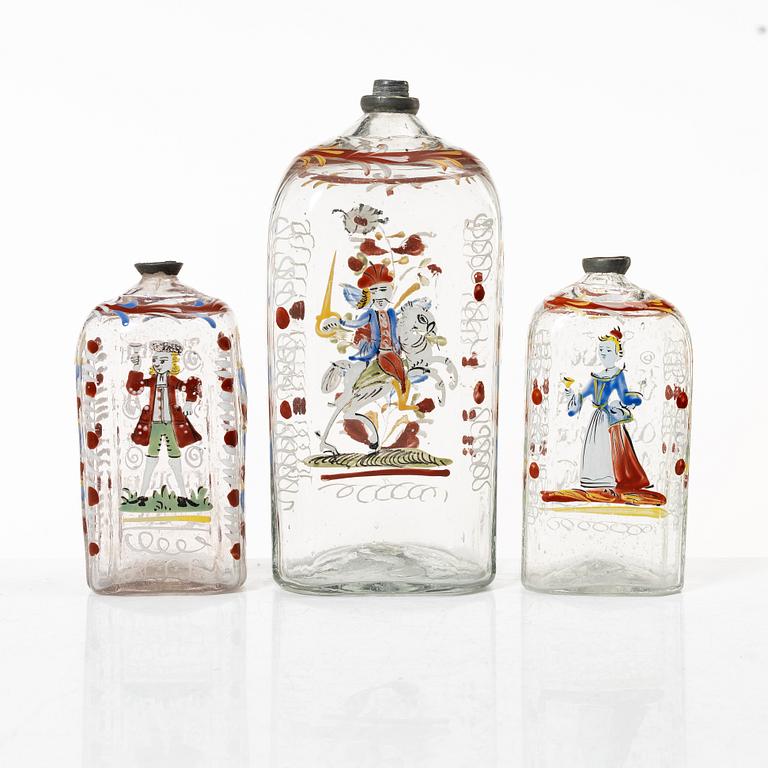 Three glass bottles, possibly Germany, 19th century.