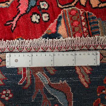 AN OLD/SEMI ANTIQUE ARAN RUG, 194 x 130 cm.