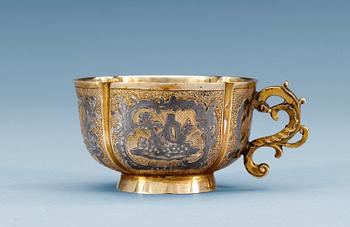 1143. A RUSSIAN SILVER-GILT AND NIELLO TSCHARKA, makers mark of Mickaelov, Moscow 1774.