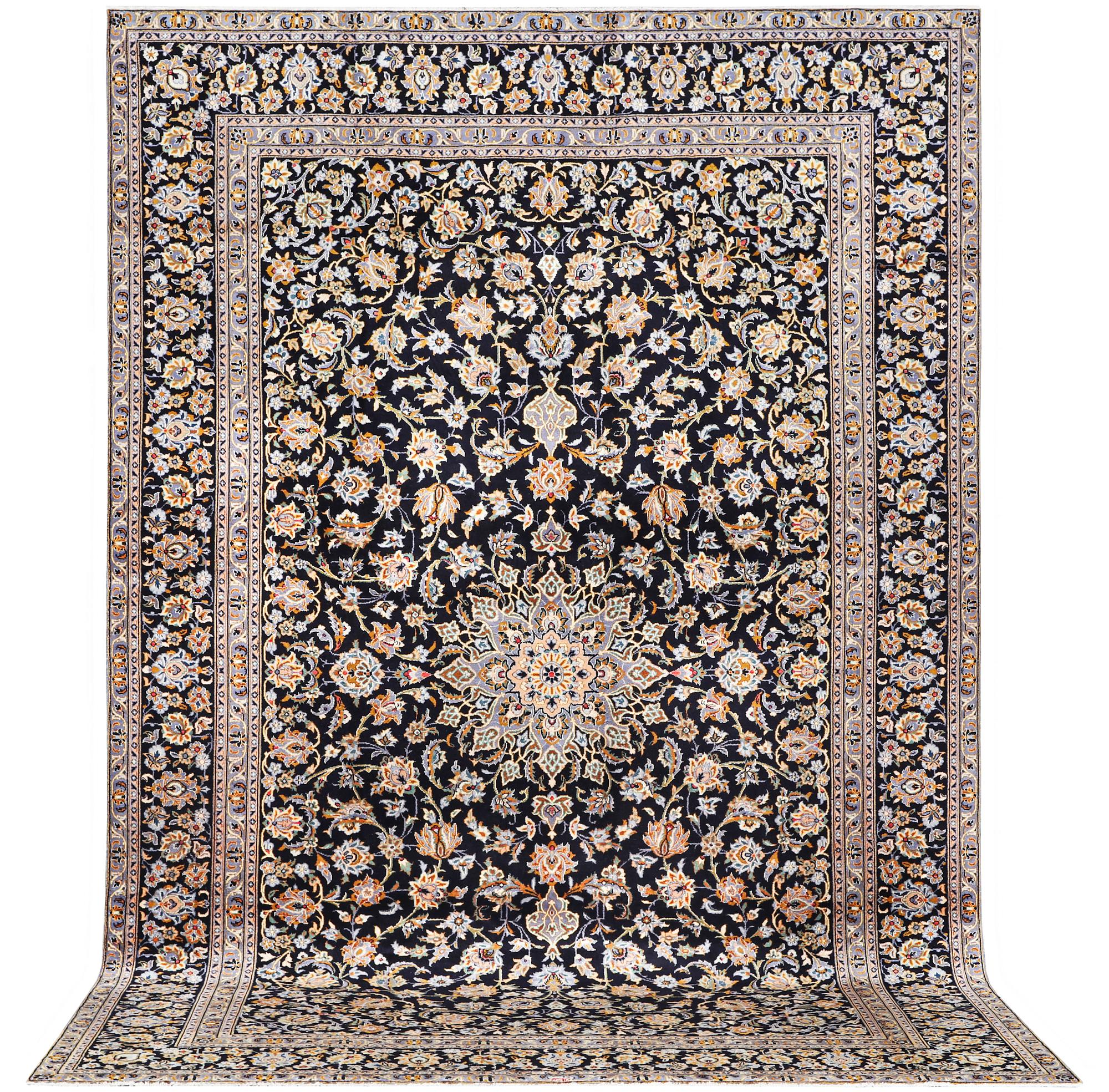 A Kashan carpet, signed, c. 410 x 270 cm.