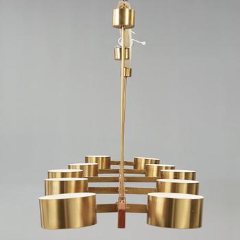 A Hans Agne Jakobsson brass and teak ceiling lamp, Markaryd Sweden 1960-70's.