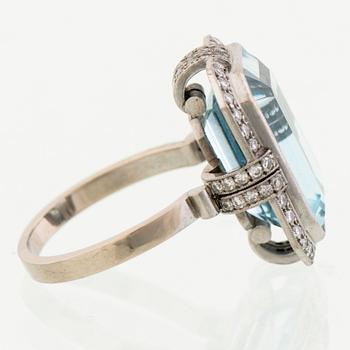 A RING, facetted aquamarine, 8/8 cut diamonds, 18K white gold. A. Tillander, Helsinki Finland 1972.