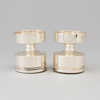 A pair of silver candlesticks by Eric Löfman, MGAB, Uppsala 1973.