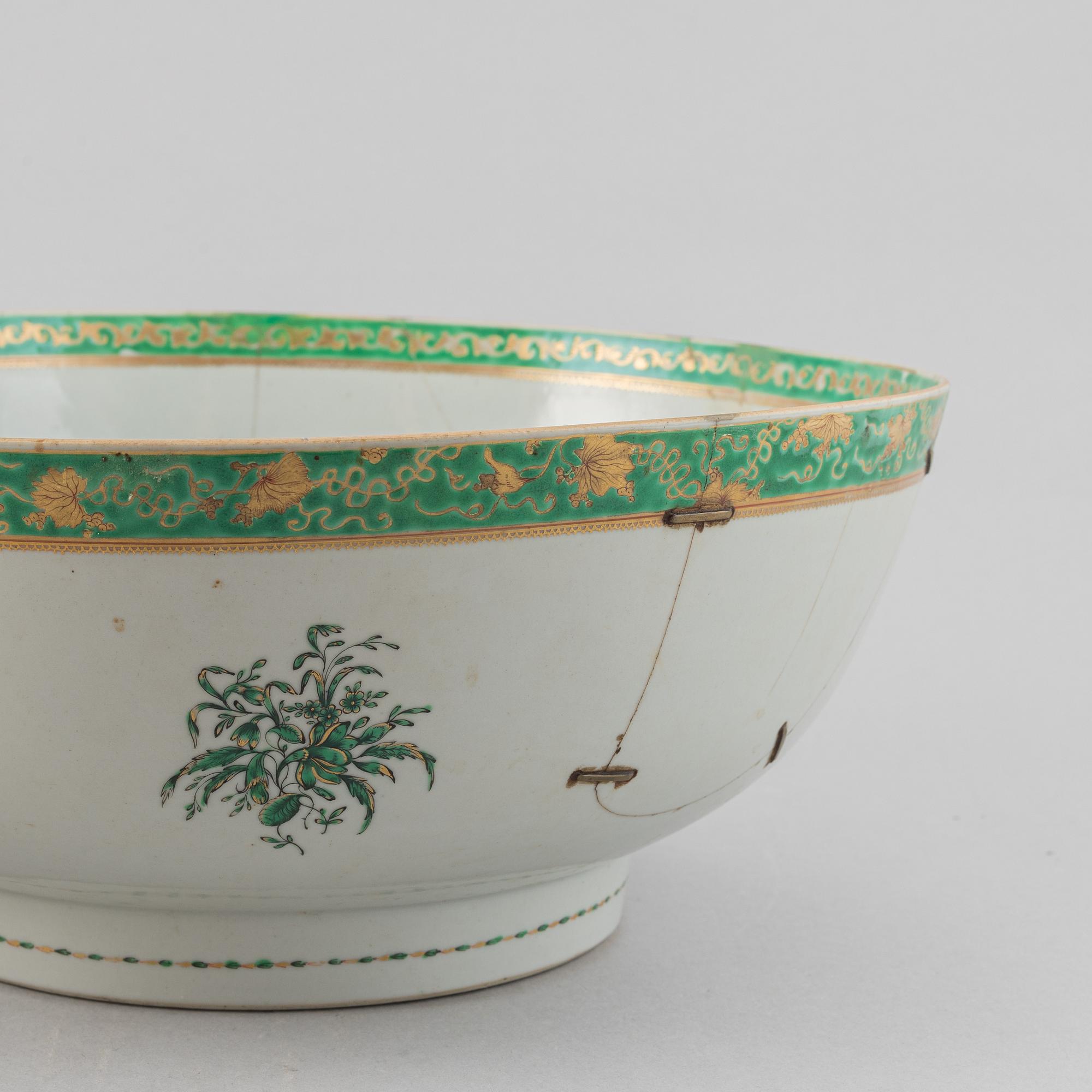 Two large famille rose and gilt punch bowls, Qing dynasty, 18th century.