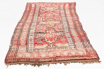 An oriental semi antique carpet, circa 272 x 120 cm.