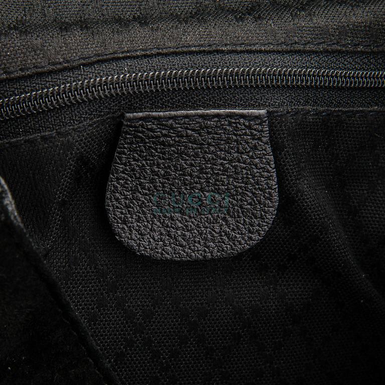 Gucci, reppu.