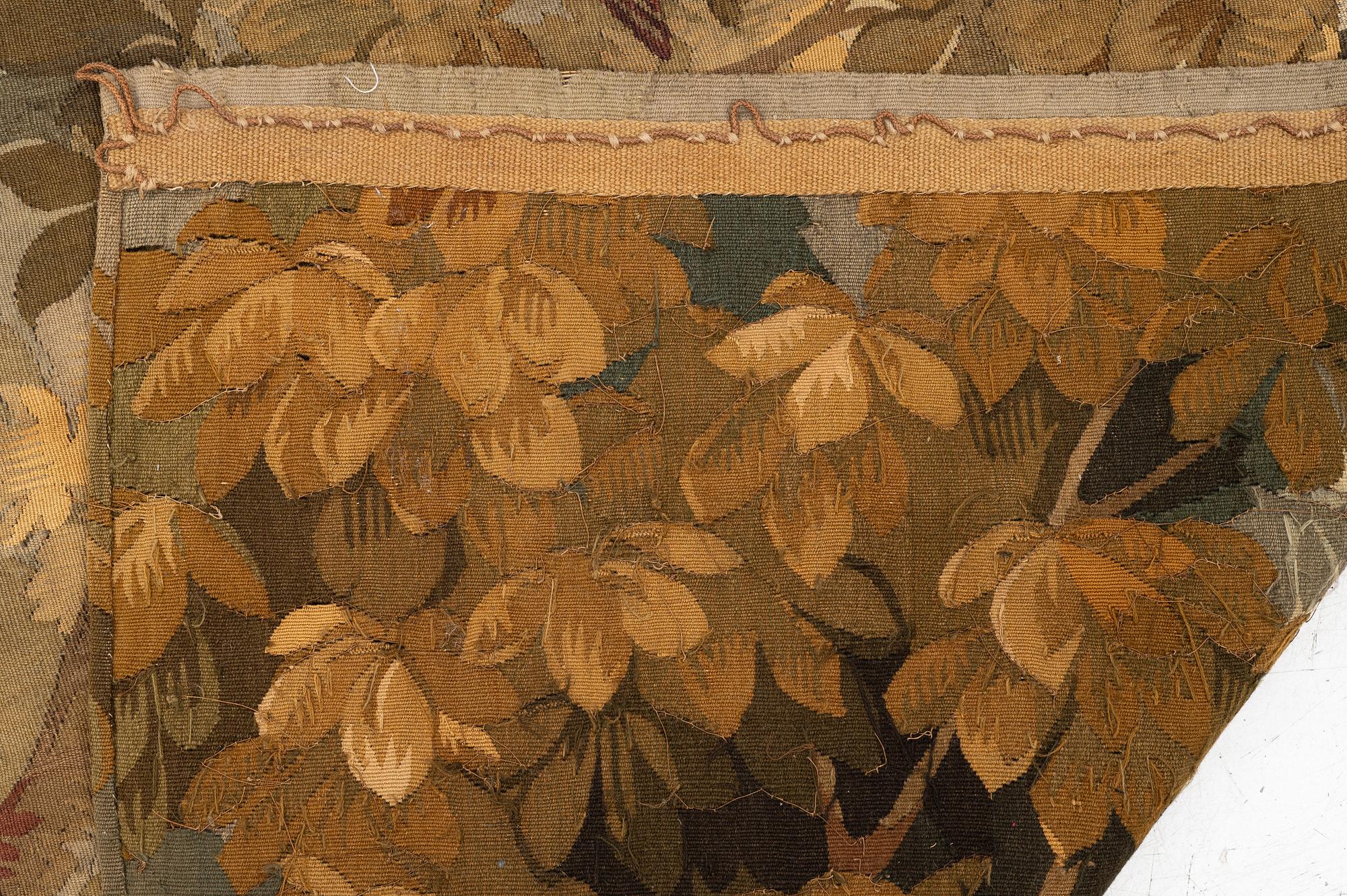 A french 'Verdur' tapestry, c. 200 x 289 cm, France, second half of the 19th century.