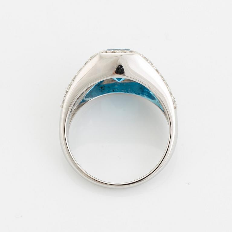 Blue topaz and brilliant cut diamond ring.