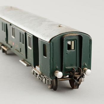 A 1940/50s model train set of 31 pcs in O-scale made by HAG, Switzerland.