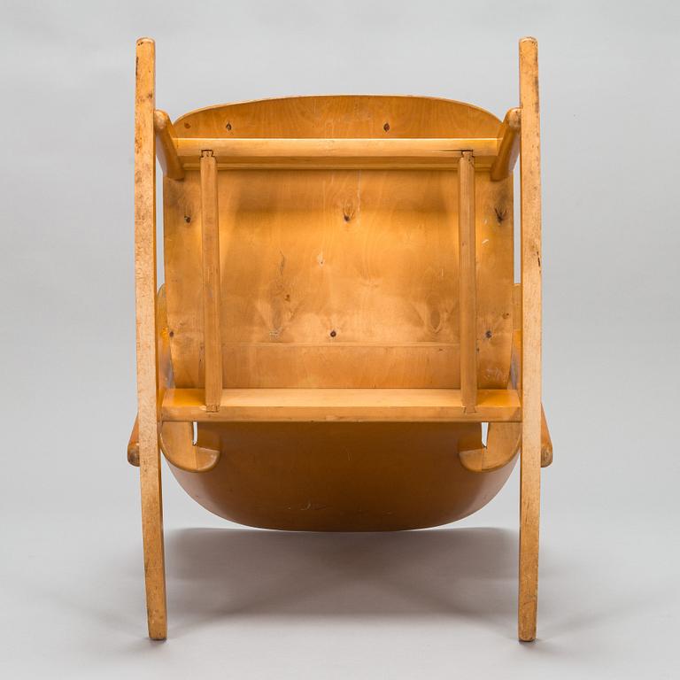 Ilmari Tapiovaara, a 1940s 'Domus' rocking chair for Keravan Puuteollisuus.