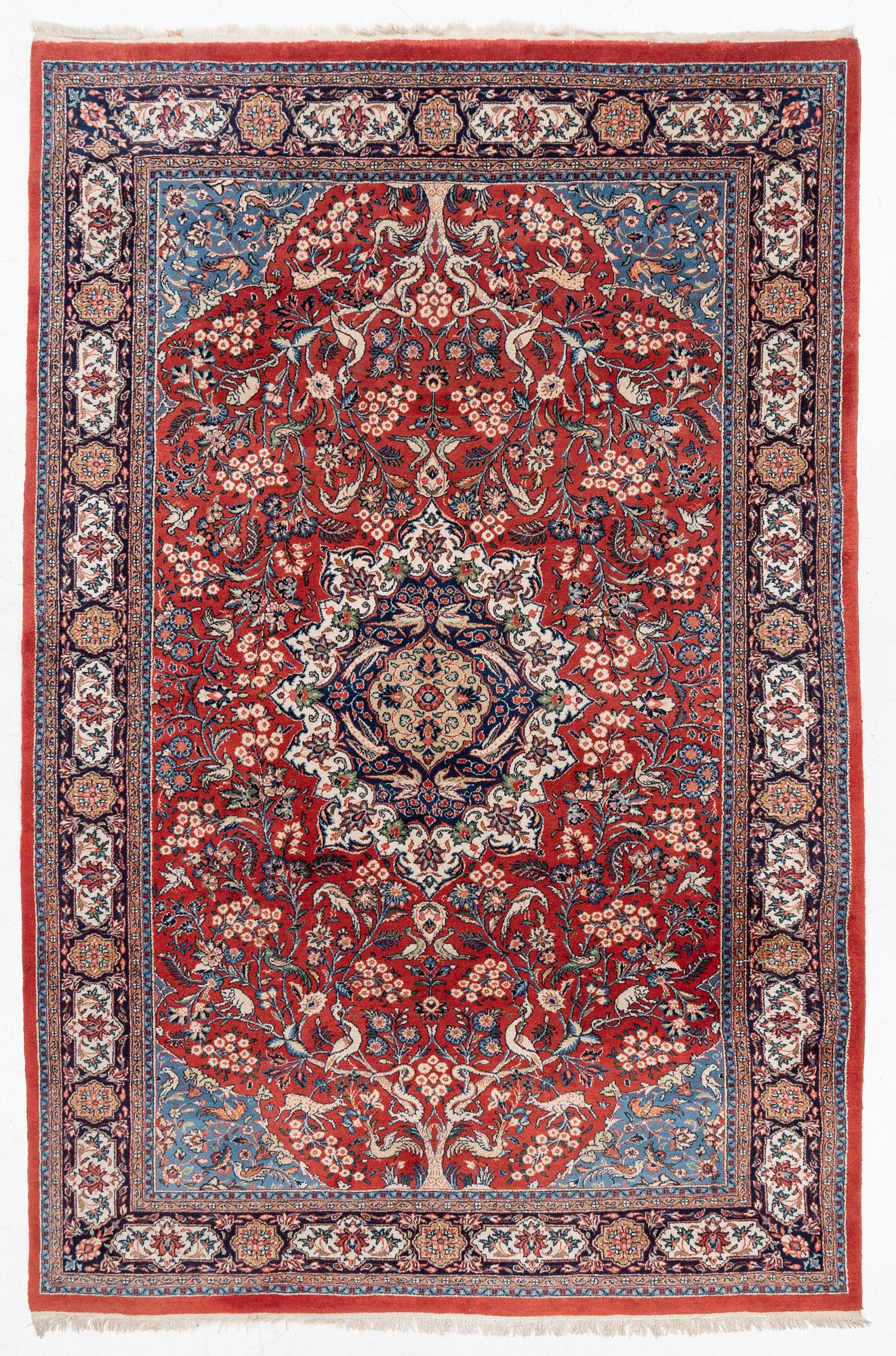 A Sarouk carpet, c. 330 x 215 cm.