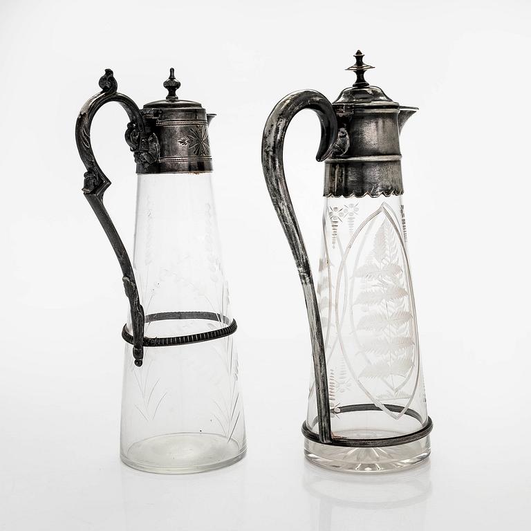 Two wine pitches, around 1900.