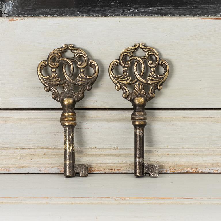 A display cabinet, early 20th century.