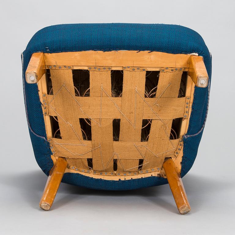 Flemming Lassen, an armchair manufactured by Asko 1952-1956.