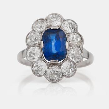 1164. A sapphire and old-cut diamond ring.