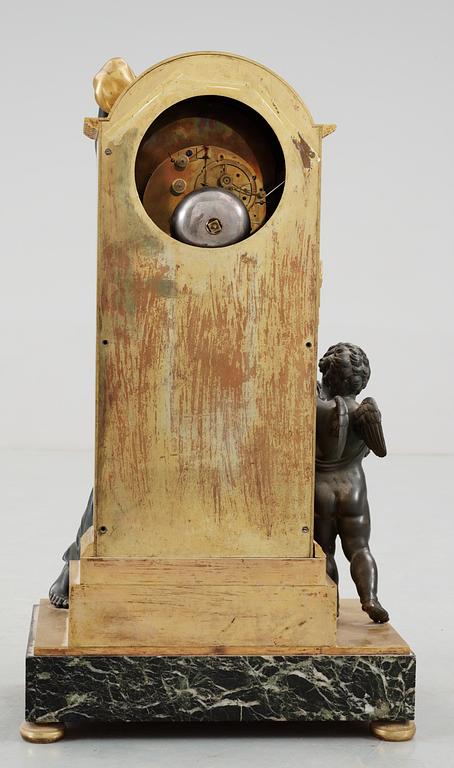 A French Empire early 19th Century mantel clock, "Amitié cachant les Heures", by Antoine André Ravrio and Porchez.