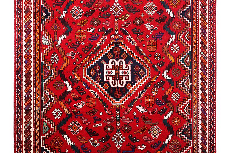 A Qashqai carpet, c. 252 x 162 cm.